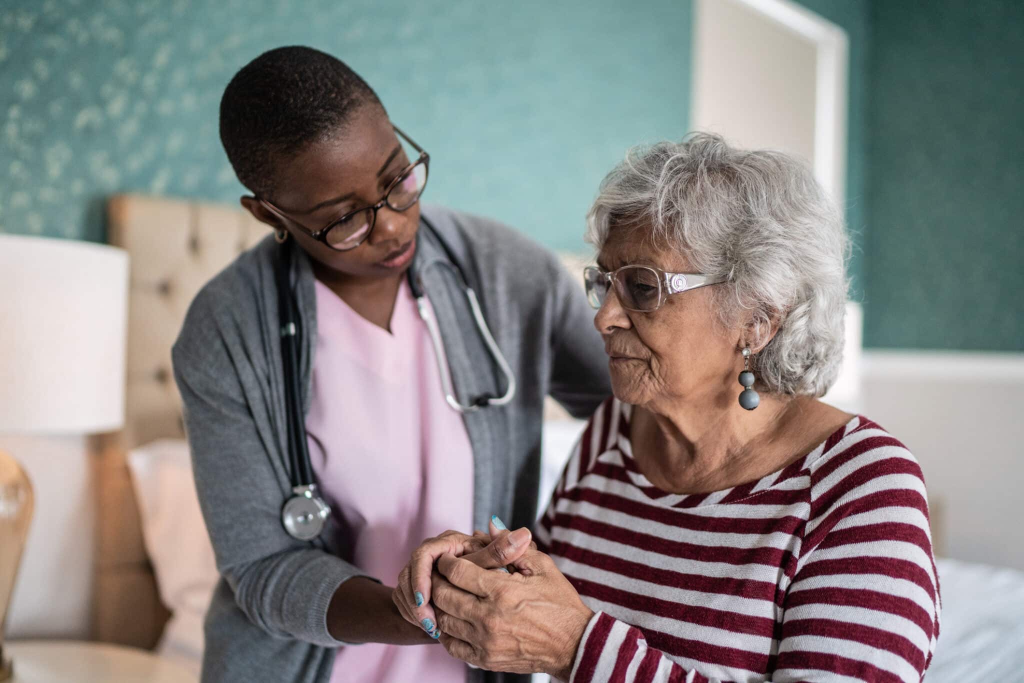 Caregiver providing support to a patient with Alzheimer's