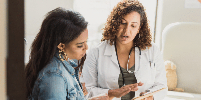 Clinician discussing a clinical trial with a patient